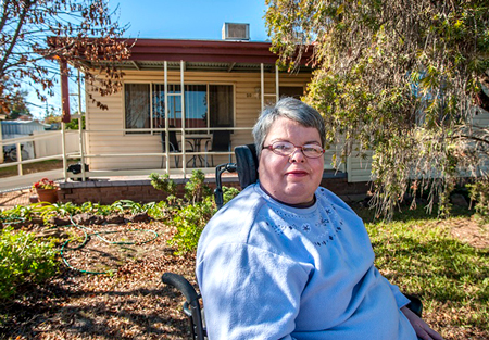 Tammy Murray outside her home.