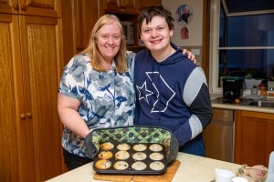 Sally-Anne and Adam with muffins hot from the oven.