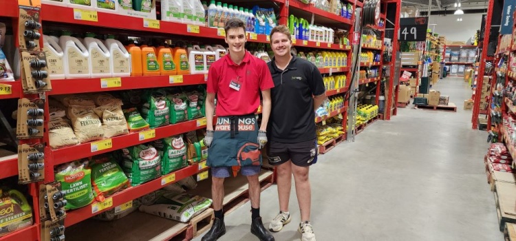 Ian setting with coworker in bunnings