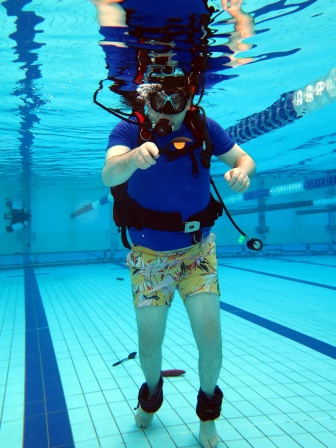 Mikkel smiles underwater as part of his immersion therapy