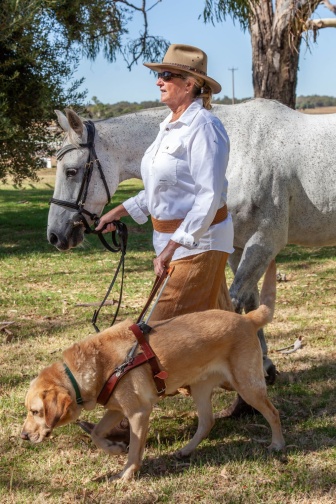 Sue-Ellen with her horse and Guide Dog.jpg