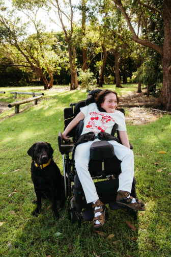 Jessika outside with her dog